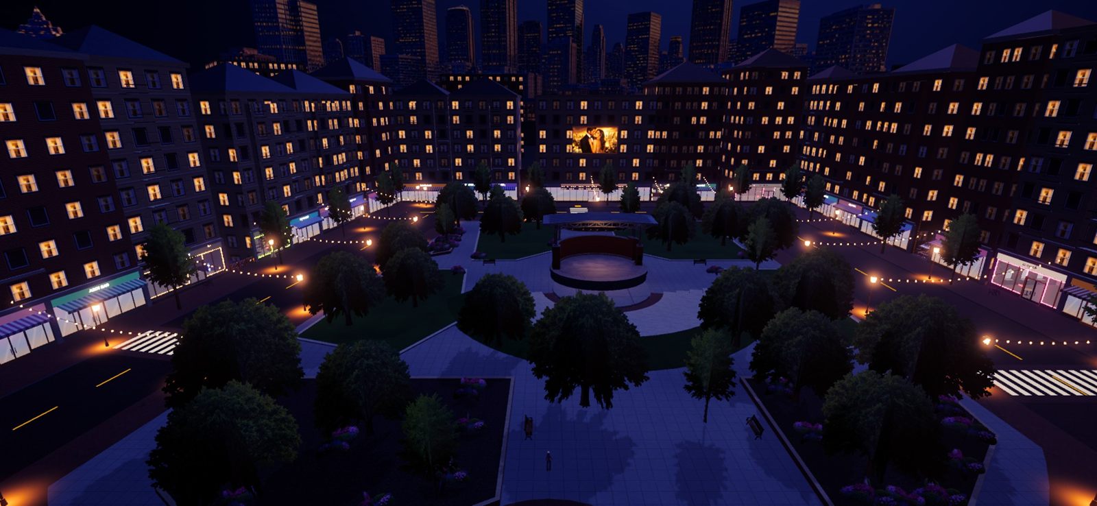 The plaza at night, from above, with lit windows and string lights.